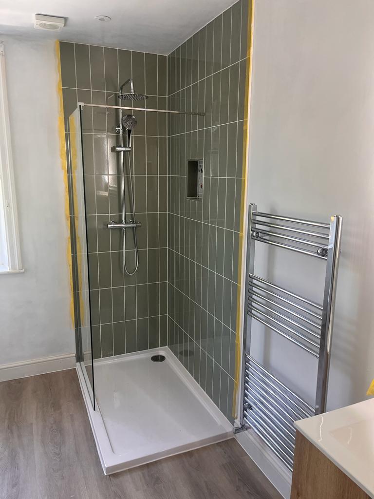 Walk-in shower with full-height tiling, part of a complete bathroom refit in Almondbury, Huddersfield