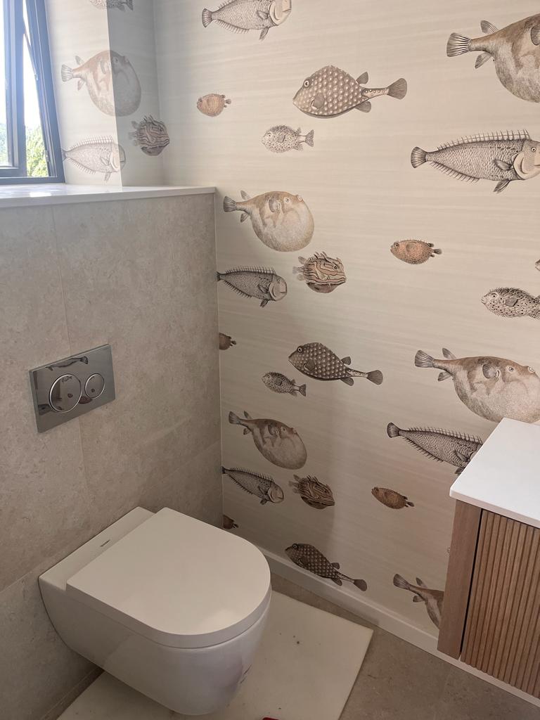 Feature wallpaper wall in a renovated bathroom in Almondbury, Huddersfield
